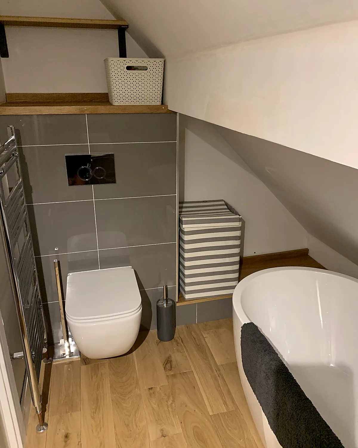 Loft bathroom with freestanding bath
