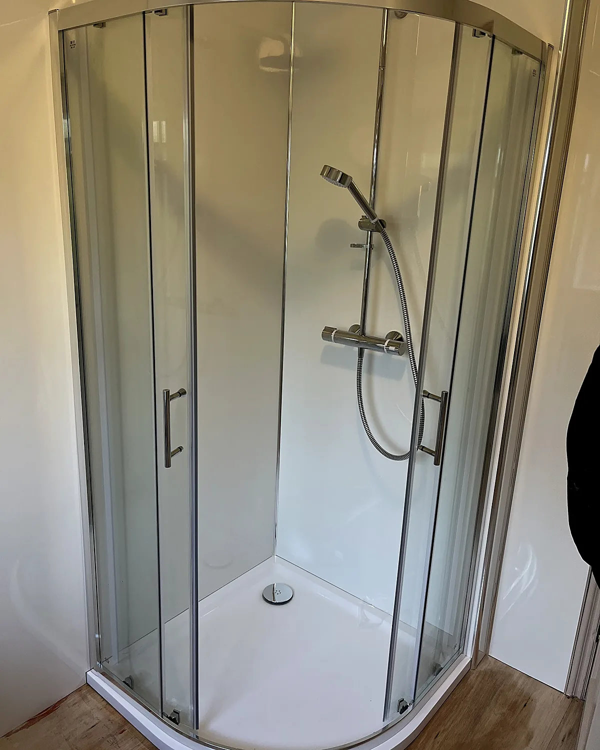 Quadrant shower enclosure